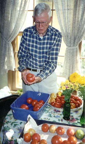 Howard with tomatoes from his garden